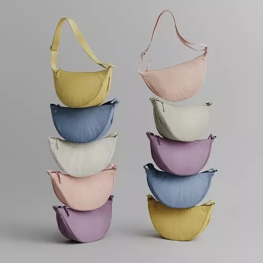 This undated handout photo provided by UNIQLO shows the UNIQLO Round Mini Shoulder Bag in different colours. Uniqlo Co. has sued rival retailer Shein over a small shoulder bag the Japanese retailer said was an inferior and unlawful copy of its hit product touted as the “Mary Poppins bag”. The lawsuit demanded Shein stop selling its product that Uniqlo said looks too much like its Round Mini Shoulder Bag.