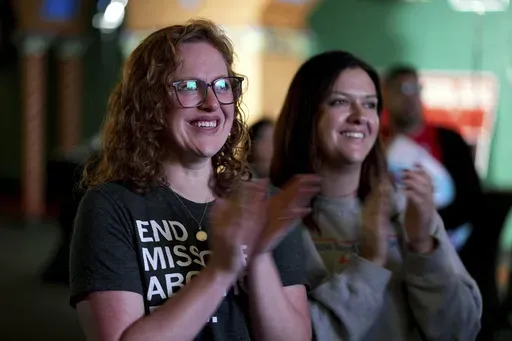 People only giving there first names Erika, left, and Leeann react after an abortion rights amendment to the Missouri constitution passed, Tuesday, Nov. 5, 2024, at a watch party in Kansas City, Mo. (AP Photo/Charlie Riedel, File)