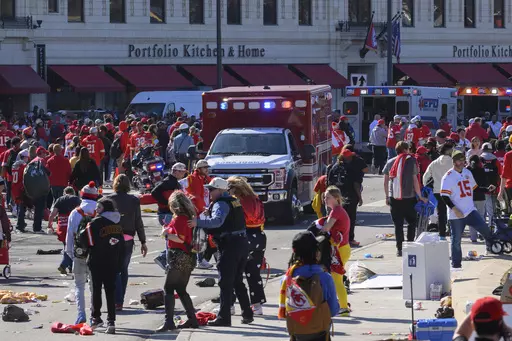 Police clear the area following a shooting at the Kansas City Chiefs NFL football Super Bowl celebration in Kansas City, Mo., Wednesday, Feb. 14, 2024. Three men from Kansas City, Mo.,, face firearms charges, including gun trafficking, after an investigation into the mass shooting during the Kansas City Chiefs’ Super Bowl parade and rally, federal prosecutors said Wednesday, March 13, 2024. (AP Photo/Reed Hoffmann, File)