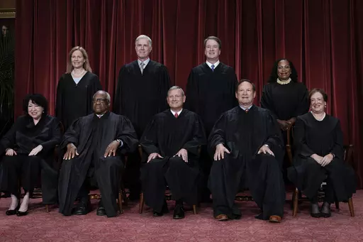 Members of the Supreme Court sit for a new group portrait following the addition of Associate Justice Ketanji Brown Jackson, at the Supreme Court building in Washington, Oct. 7, 2022. Bottom row, from left, Associate Justice Sonia Sotomayor, Associate Justice Clarence Thomas, Chief Justice of the United States John Roberts, Associate Justice Samuel Alito, and Associate Justice Elena Kagan. Top row, from left, Associate Justice Amy Coney Barrett, Associate Justice Neil Gorsuch, Associate Justice 
