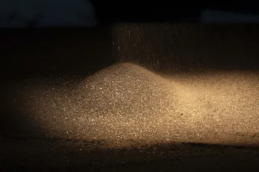 Ilmenite, a key element used to produce titanium, is collected in the country's leading titanium mining company in the central region of Kirovohrad, Ukraine, Feb. 12, 2025. (AP Photo/Efrem Lukatsky, File)