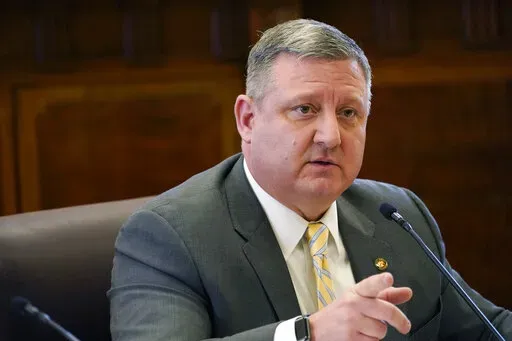 Senate Education Committee Chairman Dennis DeBar Jr., R-Leakesville, addresses lawmakers as they consider legislation during a committee meeting at the Mississippi Capitol in Jackson, Tuesday, March 1, 2022. (AP Photo/Rogelio V. Solis)