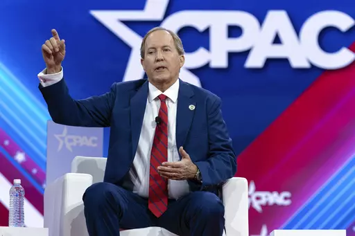 Texas Attorney General Ken Paxton speaks during the Conservative Political Action Conference, CPAC 2024, at the National Harbor in Oxon Hill, Md., Friday , Feb. 23, 2024. Paxton beat impeachment and now he wants political revenge. (AP Photo/Jose Luis Magana, File)