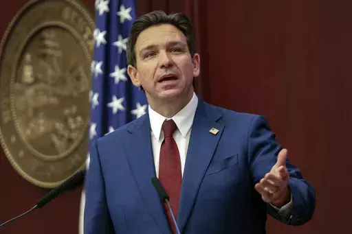 Florida Gov. Ron DeSantis gives his State of the State address during a joint session of the Senate and House of Representatives in Tallahassee, Fla., Jan. 9, 2024. A federal judge on Tuesday, June 11, 2024, struck down a 2023 Florida law that blocked gender-affirming care for transgender minors and severely restricted such treatment for adults. (AP Photo/Gary McCullough, File)