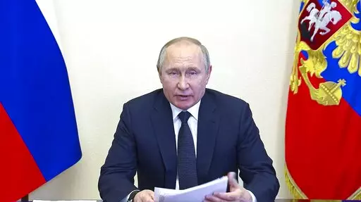 In this photo taken from video released by the Russian Presidential Press Service, Russian President Vladimir Putin speaks via videoconference at the Novo-Ogaryovo residence outside Moscow, Russia, Wednesday, March 16, 2022. (Russian Presidential Press Service via AP, File)