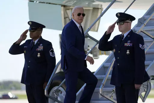 President Joe Biden boards Air Force One as he departs Milwaukee Mitchell International Airport, Wednesday, May 8, 2024, in Milwaukee. (AP Photo/Evan Vucci)