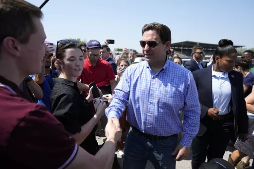 Republican presidential candidate Florida Gov. Ron DeSantis greets supporters at U.S. Sen. Joni Ernst's Roast and Ride, Saturday, June 3, 2023, in Des Moines, Iowa. (AP Photo/Charlie Neibergall)