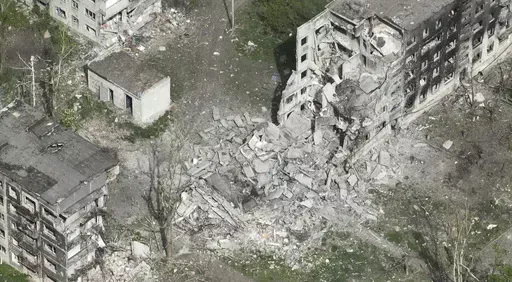 This photo taken from a drone video provided by Ukraine Patrol Police, shows devastation in Chasiv Yar, an eastern Ukrainian city Russia is assaulting, Ukraine, Monday, April 29, 2024. The footage shows the community of Chasiv Yar - which is set amid green fields and woodland - reduced to a skeletal ghost town with few residents left. The apocalyptic scene is reminiscent of the cities of Bakhmut and Avdiivka, which Ukraine yielded after months of bombardment and huge losses for the Kremlin’s f