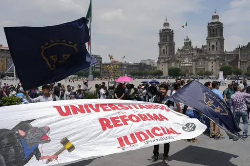 Supporters arrive to attend a rally in favor of the government's proposed judicial reform outside the Supreme Court building in Mexico City, Sept. 5, 2024. (AP Photo/Eduardo Verdugo, File)