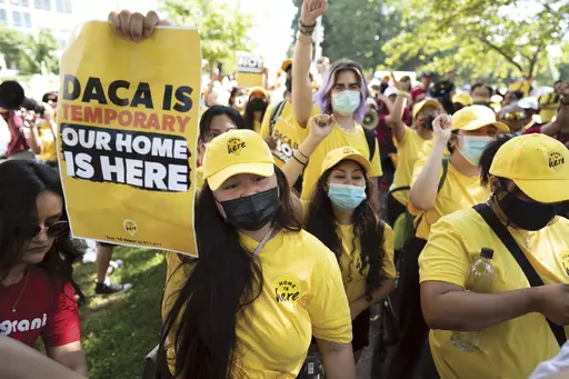 Susana Lujano, left, a dreamer from Mexico who lives in Houston, joins other activists to rally in support of the Deferred Action for Childhood Arrivals program, also known as DACA, at the U.S. Capitol in Washington, June 15, 2022. A revised version of DACA, a federal policy that prevents the deportation of hundreds of thousands of immigrants brought to the U.S. as children, is set to be debated Thursday, June 1, 2023, before a federal judge who previously ruled the program illegal. (AP Photo/J.