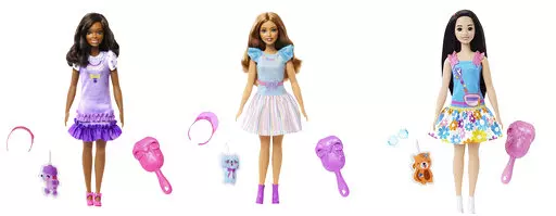 This combination of photos shows My First Barbie dolls, from left, Brooklyn, Teresa and Renee. My First Barbie, made specifically for children as young as 3, is 13.5 inches tall, with a broader waste that de-emphasizes the bust line, with flesh-tone modesty undergarments permanently attached. (Mattel via AP)
