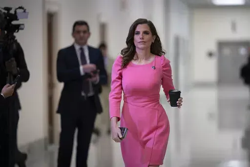 Rep. Nancy Mace, walks to join other members of the House Oversight Committee, Dec. 13, 2023, at the Capitol in Washington. Three Republican incumbent U.S. House members in South Carolina are facing primary challengers in 2024, including Mace, who is seeking a third term with the backing of Donald Trump. (AP Photo/J. Scott Applewhite, File)