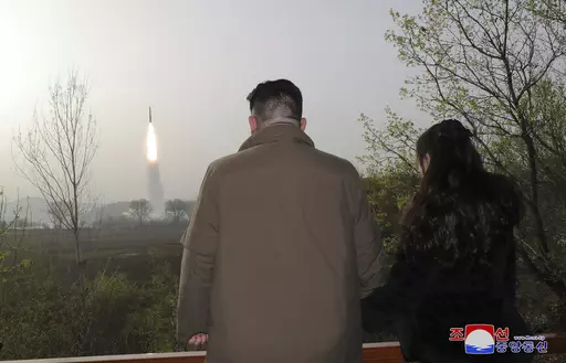 This photo provided April 14, 2023, by the North Korean government, shows North Korean leader Kim Jong Un, center, inspects what it says is the test-launch of Hwasong-18 intercontinental ballistic missile Thursday, April 13, 2023 at an undisclosed location, North Korea. Independent journalists were not given access to cover the event depicted in this image distributed by the North Korean government. The content of this image is as provided and cannot be independently verified. Korean language wa