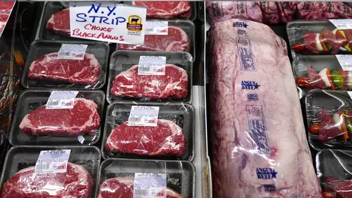 In this Tuesday, June 15, 2021 photograph, beef is displayed in the meat department at Lambert's Rainbow Market, in Westwood, Mass. The rise in consumer prices, or inflation, is a slow erosion of your money over time. And supply chain issues are a part of the inflation equation too. How can you protect yourself? Small financial moves can make a difference in helping to preserve your spending power. (AP Photo/Charles Krupa)