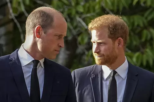 Britain's Prince William and Britain's Prince Harry walk beside each other after viewing the floral tributes for the late Queen Elizabeth II outside Windsor Castle, in Windsor, England on Sept. 10, 2022. Prince Harry flew more than 5,000 miles to see his father after King Charles III was diagnosed with cancer. But he did not see his estranged brother, William, during a visit that lasted scarcely 24 hours. William, meanwhile, returned to public duties for the first time since his wife, Kate, was 