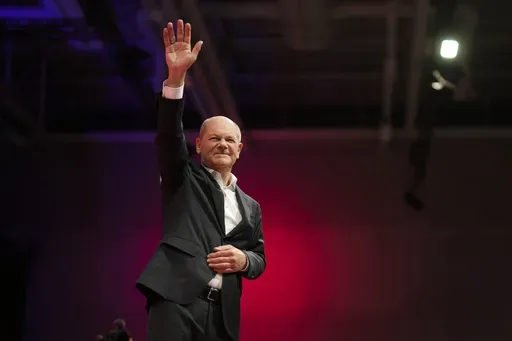 German Chancellor Olaf Scholz waves to applause after giving a speech at a special party convention in Berlin, Germany, Jan. 11, 2025. (AP Photo/Markus Schreiber, File)