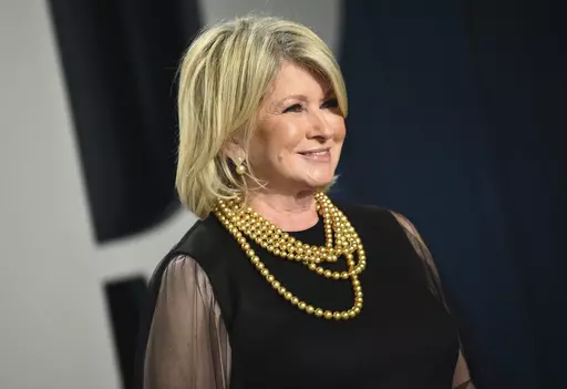 Martha Stewart arrives at the Vanity Fair Oscar Party, Feb. 9, 2020, in Beverly Hills, Calif. At 81, Stewart isn't slowing down and some might say she's heating up as one of Sports Illustrated's 2023 cover models. In an Instagram post Monday, May 15, 2023, the businesswoman and media personality wrote she hopes the cover inspires people “to try new things, no matter what stage of life you're in.” (Photo by Evan Agostini/Invision/AP, File)