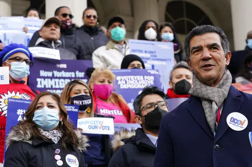 New York City Council Member Ydanis Rodriguez speaks during a rally on the steps of City Hall ahead of a City Council vote to allow lawful permanent residents to cast votes in elections to pick the mayor, City Council members and other municipal officeholders, Thursday, Dec. 9, 2021, in New York. More than 800,000 noncitizens and so-called Dreamers in New York City will have access to the ballot box, and could vote in municipal elections as early as 2023, after Mayor Eric Adams allowed legislati
