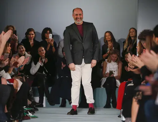Peter Copping steps out to applause from the audience after the modeling of the Oscar de la Renta Fall 2016 collection during Fashion Week in New York, Feb. 16, 2016. Lanvin, the world's longest continually-running couture house, named Peter Copping on Thursday June27, 2024 as its new artistic director. Founded in 1889 by Jeanne Lanvin and based in Paris, Lanvin will welcome Copping as the creative head of its women's and men's collections starting in fall. (AP Photo/Julie Jacobson, File)