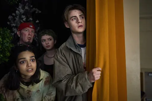 This image released by A24 shows Rachel Zegler, from left, Fred Durst, Lachlan Watson and Jaeden Martell in a scene from "Y2K." (A24 via AP)