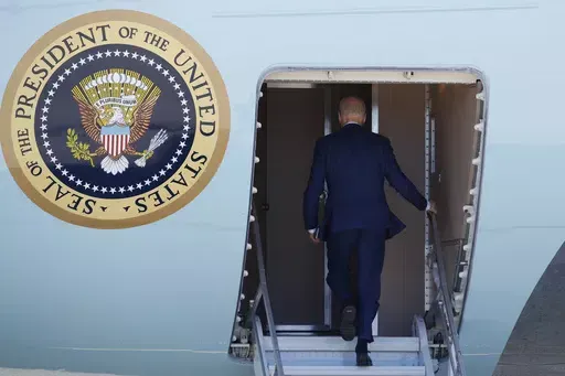 President Joe Biden boards Air Force One, March 11, 2024, at Andrews Air Force Base, Md. The White House and the Democratic National Committee are splitting the cost of Biden’s travel while he runs for a second term. It’s part of a longstanding arrangement that prevents taxpayers from being stuck with the full bill for political trips. (AP Photo/Luis M. Alvarez, File)