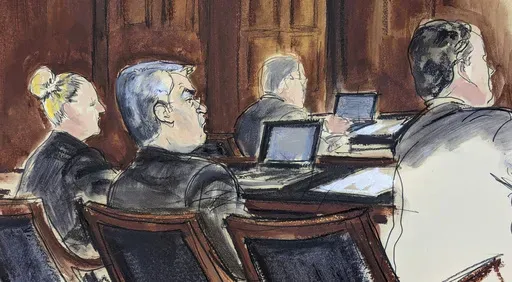 In this courtroom sketch in Federal court, in New York, Tuesday, Feb. 20, 2024, former Honduran President Juan Orlando Hernandez, seated center at the defense table, is flanked by his attorneys at the start of his trial. Nearly two years after his arrest and extradition to the U.S., Hernandez went on trial Tuesday in Manhattan federal court on drug trafficking and weapons charges. (Elizabeth Williams via AP)