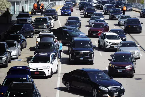 Heavy traffic is seen at O'Hare International Airport in Chicago, Monday, April 15, 2024. Relentlessly rising auto insurance rates are squeezing car owners and stoking inflation. Auto insurance rates rose 2.6% in March and are up 22% from a year ago. (AP Photo/Nam Y. Huh, File)