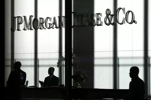 The JPMorgan Chase & Co. logo is displayed at their headquarters in New York on Oct. 21, 2013. You'll no longer be able to store your precious coins, jewelry and paperwork at JPMorgan Chase & Co., as the bank has stopped opening new safety deposit boxes for customers. A spokesman for the bank said Chase decided late last year to stop offering new deposit boxes to customers as a “business decision” but declined to share specifics. (AP Photo/Seth Wenig, File)