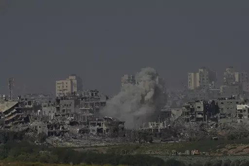 Smoke rises from the Gaza Strip during the ongoing bombardment by the Israeli military on Tuesday, Oct. 31, 2023. Over the past five days, Israeli ground troops have pushed deeper and deeper into Gaza in their war against Hamas, launched in response to a bloody Oct. 7 cross-border raid by the Islamic militant group. Yet even as the operation expands each day, the army refuses to call it an invasion. Its vague choice of words appears to be a deliberate strategy aimed at keeping its enemy off bala