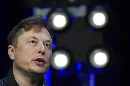 Tesla and SpaceX Chief Executive Officer Elon Musk speaks at the SATELLITE Conference and Exhibition March 9, 2020, in Washington.  According to a regulatory filling, the Tesla CEO donated about 5 million shares of company stock worth roughly $5.7 billion to charity in November 2021. Tesla didn’t respond to a request for comment and Musk has not commented on Twitter about the donation since the filing with the U.S. Securities and Exchange Commission was made public Monday, Feb. 14, 2022.  (AP 