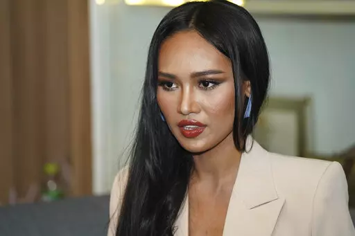 Thaw Nandar Aung, a model from Myanmar speaks to a reporter in Bangkok, Thailand on March 31, 2021. The model, also known as Han Lay,  from Myanmar who denounced her country’s military rulers last year from the stage of a beauty pageant in Thailand said Friday, Sept. 23, 2022, she fears she may be forced back home. (AP Photo/Napaxalun Sattayatam)