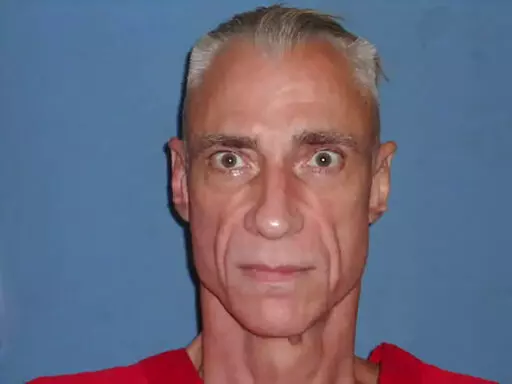 In this May 25, 2022, photo released by the Mississippi Department of Corrections is Thomas Edwin Loden Jr. The Mississippi attorney general's office is asking the state to set an execution date for Loden, now 58. The former U.S. Marine Corps recruiter was convicted in the 2000 rape and killing of a 16-year-old waitress, and has been on death row since 2001, when he pleaded guilty to capital murder, rape and four counts of sexual battery. (Mississippi Department of Corrections via AP)