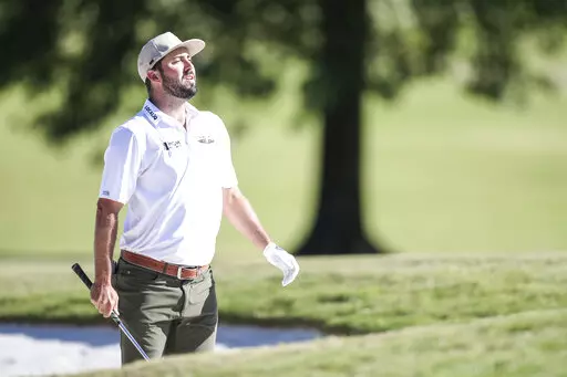 Hubbard looks to the ninth green from the sand trap during the third round of the Sanderson Farms Championship golf tournament in Jackson, Miss., Saturday, Oct. 1, 2022. (James Pugh/impact601.com via AP)