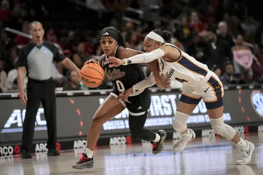 Mississippi State guard Denim DeShields (0) dribbles against California guard Kayla Williams (4) during the first half in the first round of the NCAA college basketball tournament Saturday, March 22, 2025, in Los Angeles. (AP Photo/Eric Thayer)