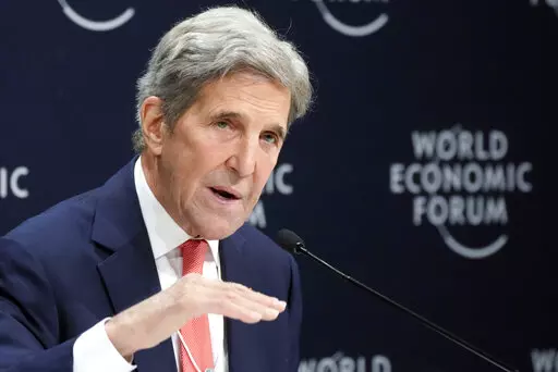 John F. Kerry, Special Presidential Envoy for Climate of the United States, gestures during a news conference at the World Economic Forum in Davos, Switzerland, May 24, 2022. Kerry said Friday, July 1, that setbacks for President Joe Biden's climate efforts at home have “slowed the pace” of some of the commitments from other countries to cut climate-wrecking fossil fuels, but he insisted the U.S. would still achieve its own ambitious national climate goals in time. (AP Photo/Markus Schreiber