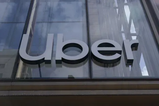 An Uber sign is displayed at the company's headquarters in San Francisco, Sept. 12, 2022. (AP Photo/Jeff Chiu, File)