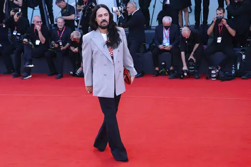 Alessandro Michele poses for photographers upon arrival at the premiere of the film 'Don't Worry Darling' during the 79th edition of the Venice Film Festival in Venice, Italy, Monday, Sept. 5, 2022.  Michele is leaving his role as creative director of the Gucci, the fashion house announced Wednesday, Nov. 23, 2022 bringing an end to an eight-year tenure that sharply redefined Gucci’s codes with romanticism and gender-fluidity, all the while powering revenues for the Kering parent. (Photo by Jo