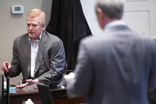 Defendant Alex Murdaugh is cross examined by prosecutor Creighton Waters while testifying in his murder trial at the Colleton County Courthouse, Feb. 24, 2023, in Walterboro, S.C. Prosecutors in the case against Murdaugh had no murder weapon or any other direct evidence linking him to the killings of his wife and son. Yet, a jury took less than three hours to convict him — thanks, in large part, to the defendant himself. (Joshua Boucher/The State via AP, Pool, File)