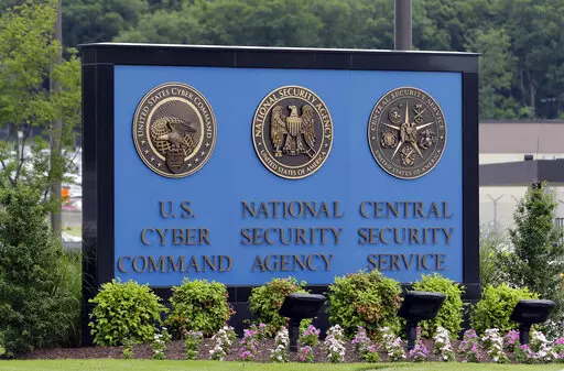 A sign stands outside the National Security Administration (NSA) campus on in Fort Meade, Md., on June 6, 2013. The national reckoning over racial inequality sparked by George Floyd's murder two years ago has gone on behind closed doors inside America's intelligence agencies. Shortly after his death, employees of the National Security Agency had a call to speak to their director about racism and cultural misunderstandings. One by one, officers spoke about examples of racism that they had seen in