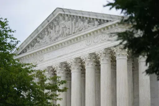 The U.S. Supreme Court building in Washington, Monday, June 27, 2022. The satirical site The Onion has some serious things to say in defense of parody. The online humor publication has filed a Supreme Court brief in support of a man who was arrested and prosecuted for making fun of the Parma, Ohio, police force on social media. (AP Photo/Patrick Semansky, File)