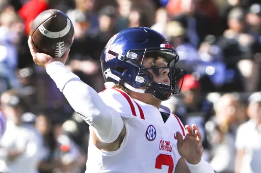 Mississippi quarterback Jaxson Dart (2) throws a pass during the first half of the team's NCAA college football game against Vanderbilt on Saturday, Oct. 8, 2022, in Nashville, Tenn. Mississippi won 52-28. (AP Photo/John Amis)