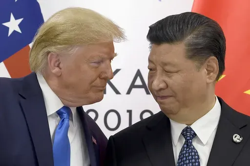In this Saturday, June 29, 2019, file photo, U.S. President Donald Trump, left, meets with Chinese President Xi Jinping during a meeting on the sidelines of the G-20 summit in Osaka, Japan.(AP Photo/Susan Walsh, File)