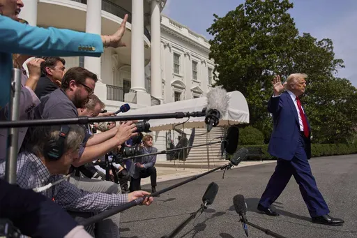 President Donald Trump walks to board Marine One after speaking with reporters on the South Lawn of the White House, April 3, 2025, in Washington. (AP Photo/Evan Vucci)