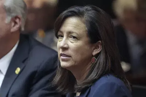 State Rep. Julie McGuire partakes in the first legislative session of the year Monday, Jan. 9, 2023, at the Indiana Statehouse in Indianapolis. Indiana Republican delegates will gather Saturday, June 15, 2024, to elect a nominee for lieutenant governor where Micah Beckwith is challenging Sen. Mike Braun's choice of McGuire. (Jenna Watson/The Indianapolis Star via AP, File)