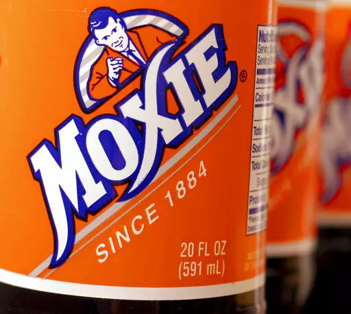 FILE — Bottles of the soft drink Moxie sit together, May 27, 2005, in West Bath, Maine. Moxie, a polarizing beverage that is the state's official soft drink, is in short supply because of supply chain woes, Tuesday, Feb. 8, 2022. The soda is beloved by thousands of Mainers and is the subject of a summer festival. (AP Photo/Pat Wellenbach, File)