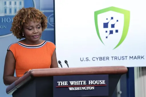 White House press secretary Karine Jean-Pierre talks about a cybersecurity certification and labeling program at the White House in Washington, July 18, 2023. The federal government is rolling out a consumer labeling system designed to help Americans pick smart devices that are less vulnerable to hacking. Under the voluntary program, called the U.S. Cyber Trust Mark Initiative, manufacturers can affix the label on their products if they meet federal cybersecurity standards. (AP Photo/Susan Walsh