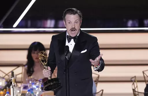 Jason Sudeikis accepts the Emmy for outstanding lead actor in a comedy series for "Ted Lasso" at the 74th Primetime Emmy Awards on Monday, Sept. 12, 2022, at the Microsoft Theater in Los Angeles. (AP Photo/Mark Terrill)