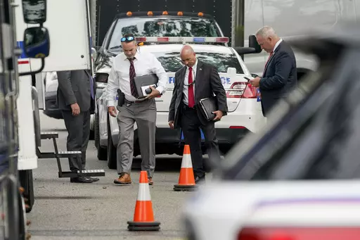 Authorities search the home of suspect Rex Heuermann, Tuesday, July 18, 2023, in Massapequa Park, As new details emerge about how police finally caught the alleged Gilgo Beach serial killer, they've also raised questions about whether investigators adequately pursued a key lead that may have helped solve the case sooner. (AP Photo/John Minchillo, File)