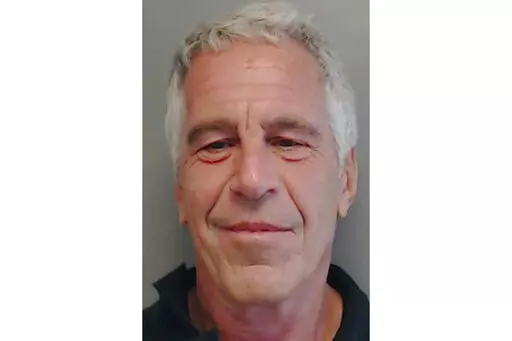 This image provided by the Florida Department of Law Enforcement shows financier Jeffrey Epstein, on July 25, 2013. A statement released on Sunday, Jan 1, 2023, by the governor of the U.S. Virgin Islands, relieved of her duties the attorney general who pursued various cases against disgraced financier Jeffrey Epstein, including a lengthy legal fight that resulted in a $105 million settlement. (Florida Department of Law Enforcement via AP File)
