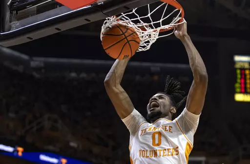 Tennessee forward Jonas Aidoo (0) dunks the ball during the first half of an NCAA college basketball game against Mississippi Saturday, Jan. 6, 2024, in Knoxville, Tenn. (AP Photo/Wade Payne)